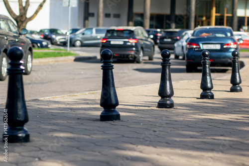 Wallpaper Mural There is a striking row of black chess pieces displayed on the sidewalk Torontodigital.ca
