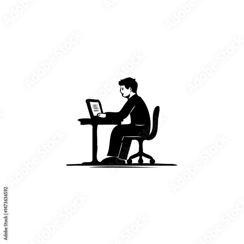 Silhouette of focused individual working remotely on laptop at minimalist workspace
