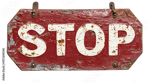 Vintage weathered stop sign with white letters on a red background.