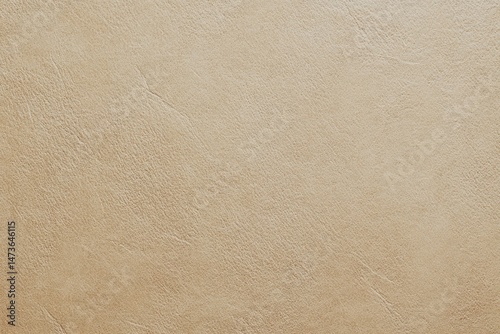 Light beige, smooth, textured surface.  Close-up view of a light beige material. Subtle, fine lines and slight variations in tone create a textured appearance