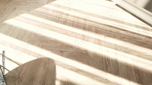 New laminate flooring. Laminated parquet with brown wooden texture