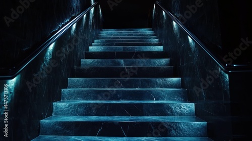 Dark, illuminated marble staircase