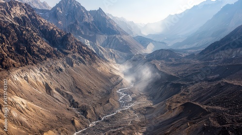Aerial View of Deep Canyon River Carving Through Rocky Terrain, Majestic Landscape, Scenic River Valley, Dramatic Canyon Gorge.