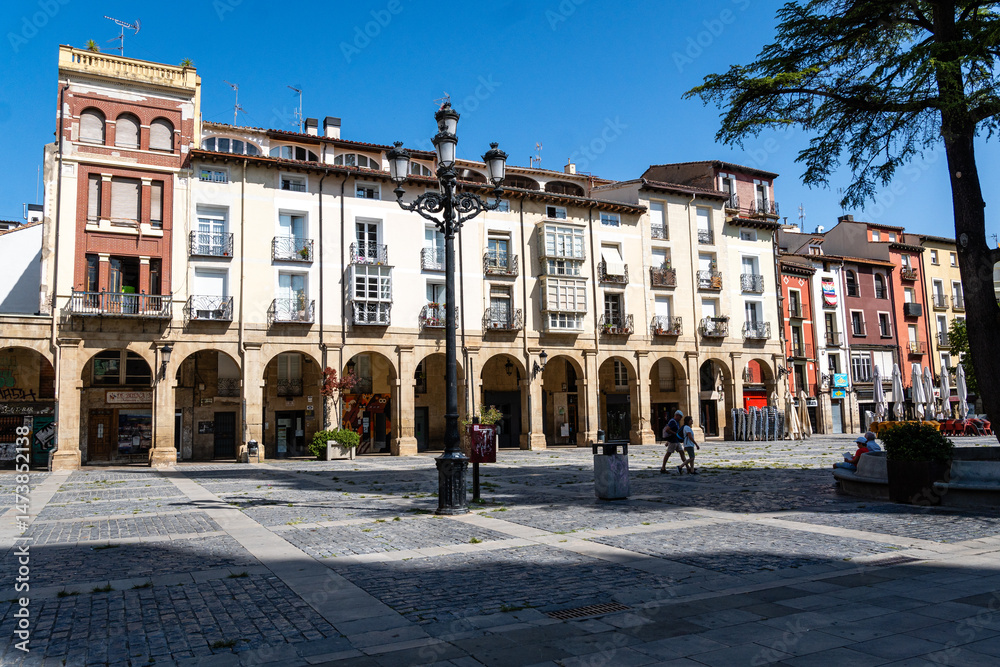 Obraz premium Logroño, Spain-August 22, 2024. View of the Historic Market Square in the Center of Logroño, La Rioja, Spain, with Traditional Architecture and Cobblestone Streets