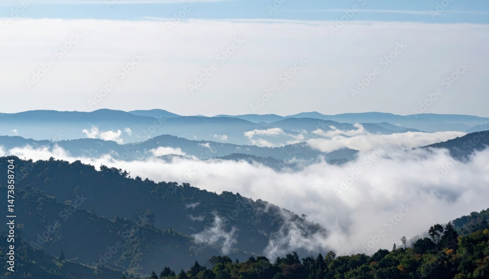 Fototapeta premium Exploring majestic mountain landscapes amidst misty clouds in nature's serenity scenic view photographic landscape