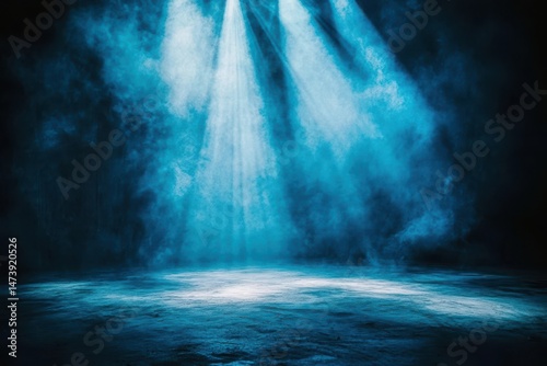 A stage illuminated by blue light rays, casting a dramatic and atmospheric ambiance for performances or events.