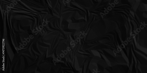 Black crumpled paper texture . Black wrinkled paper texture. Black paper texture . Crumpled and top view textures can be used for background of text or any contents .	