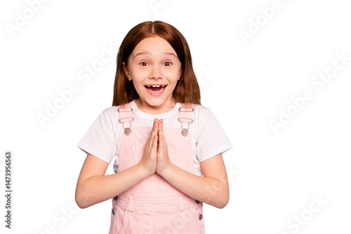 Foto Close up photo of astonished cute kid hands palms together plead expect isolated