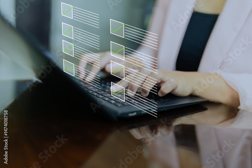 A user is working on a laptop with a digital checklist interface overlayed, each item marked with a green check, representing task completion, productivity, and workflow organization.