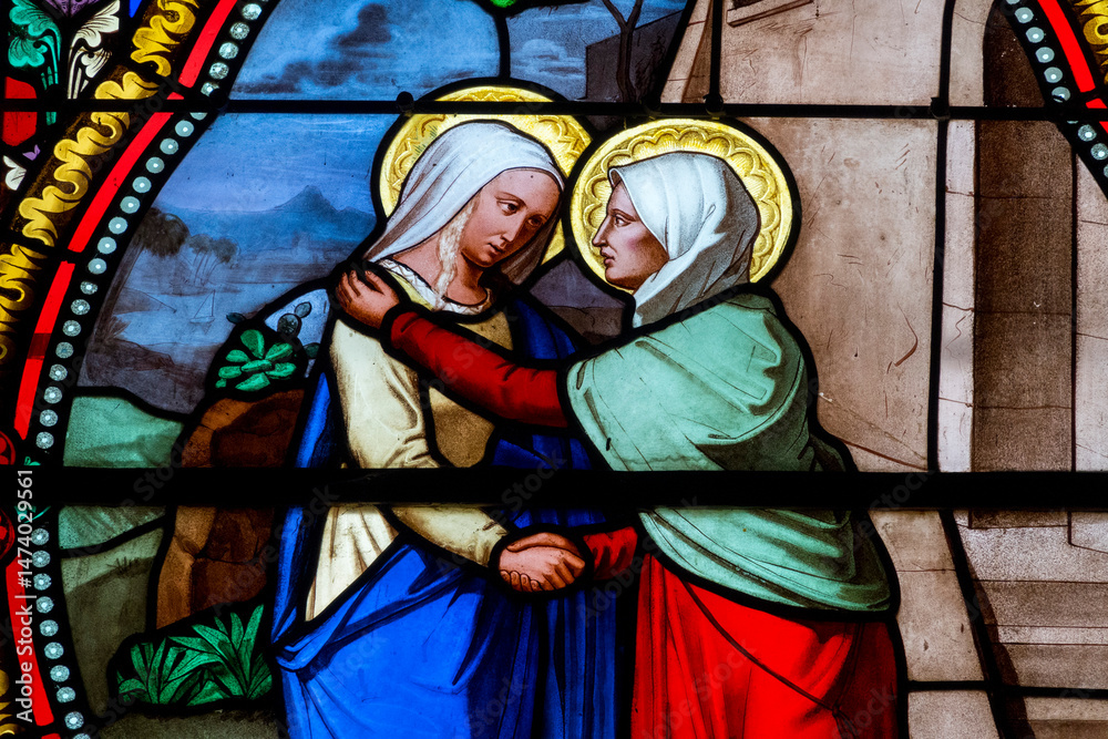 Fototapeta premium Stained glass (19th century) of Visitation of the Virgin Mary to her pregnant cousin Elizabeth.