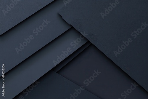 Dark, layered, geometric shapes in deep navy. Intersecting planes create a modern, abstract design.  A close-up view emphasizes the texture and depth of the materials