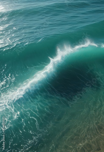 Shimmering blue-green water, rolling waves breaking ,  bright,  coastal,  ocean texture