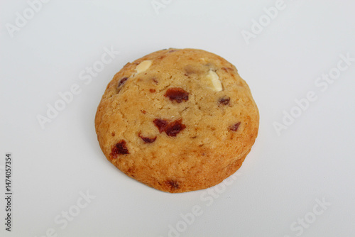 White choco soft cookie with almond and berry cuts, isolated on white background
