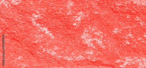 Reddish orange concrete wall texture for background and wallpaper. Decorative wall with red orange concrete stone cement.

