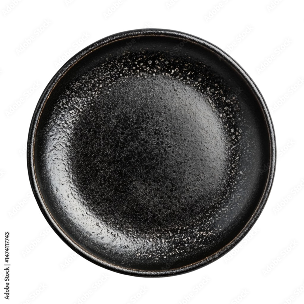 Dark speckled round plate empty top view Dark speckled round plate empty top view