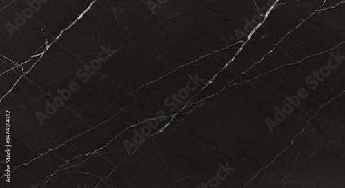 A black stone with a pattern of lines and dots