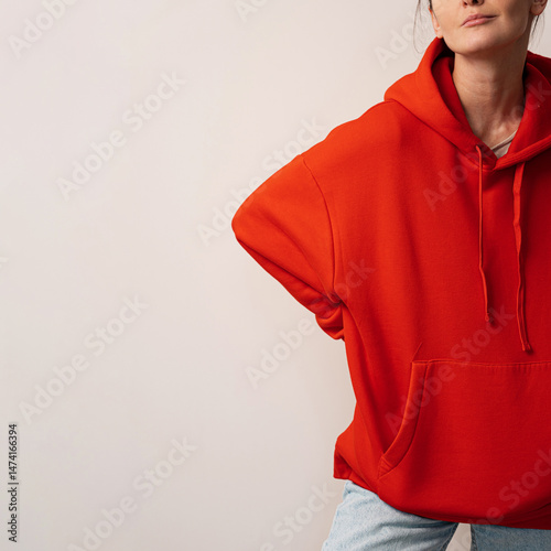Stylish Woman in Red Hoodie photo