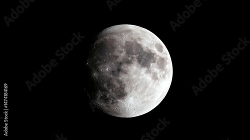 A partially eclipsed moon, grayscale, dark background, showing lunar surface details