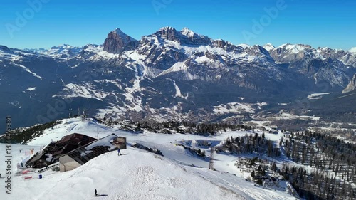 Cortina d'Ampezzo, Italy: Aerial view of famous ski resort in Dolomites (Dolomitic Alps)  and venue of Winter Olympics Milano Cortina 2026, sunny day - landscape panorama of Europe from above
