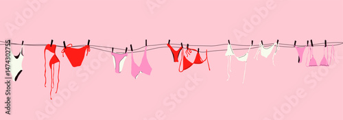 Swimsuits Hanging on a Clothesline. Pink Background Outdoor Scene