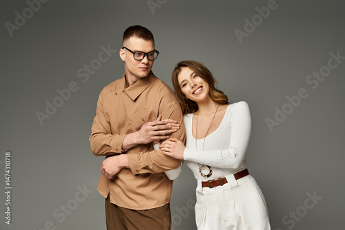 Joyful couple celebrating love with elegance and style in a modern setting
