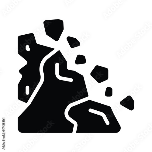 A slope with falling rocks, symbolizing landslide warnings