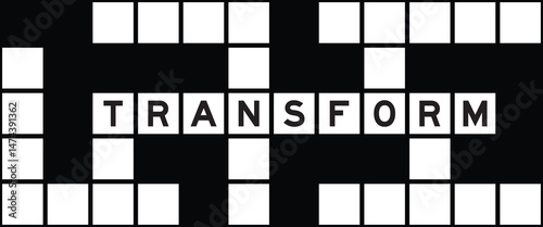 Alphabet letter in word transform on crossword puzzle background