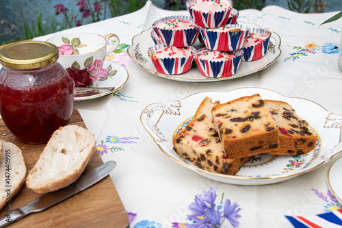 garden  party  afternoon  tea party  fruit  cakes and  china  with  bunting  vintage  style  