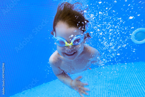 Underwater boy swimming