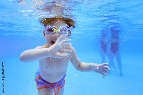 Underwater boy swimming