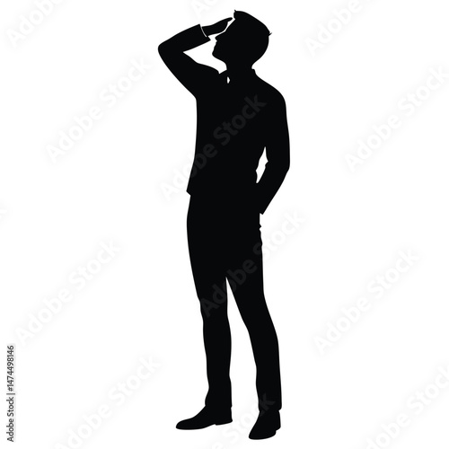 Full silhouette of thoughtful man standing with hand on forehead looks upward intently