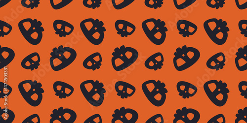 Seamless Halloween pattern with pumpkin skull silhouettes on orange background. Minimalist spooky design perfect for wrapping paper, backgrounds, decorations, and seasonal branding