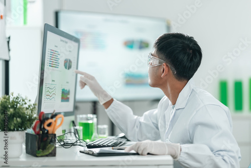 Scientists examining plant ...