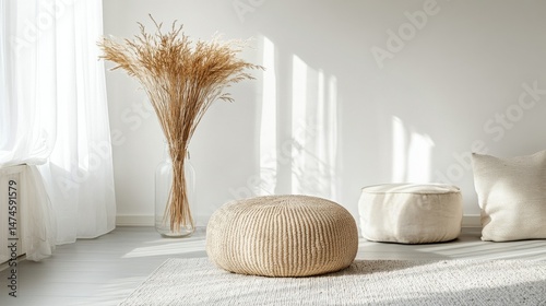 Bright Space with Pouf and Dried Reeds in Glass Vase