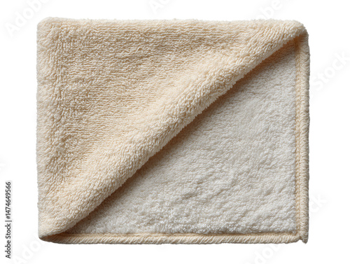 Soft beige towel folded on white background.