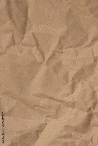 Crumpled brown butcher paper with wrinkled and textured background