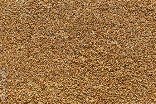 Brown epdm flooring, where the material is shaped like sand but is soft.