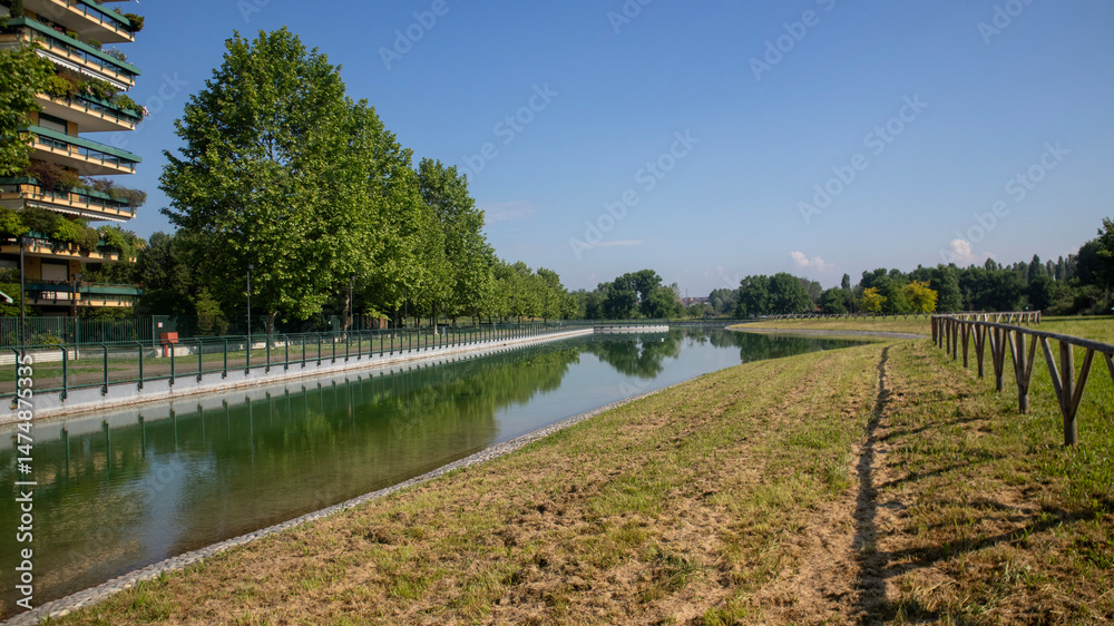 Fototapeta premium Segrate artificial lake Malaspina residential area near milan