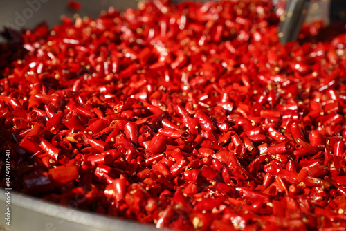 Close up stir-fried fresh red chili chopped for making curry paste. 