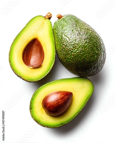 Fresh avocado cut in half with seed visible.