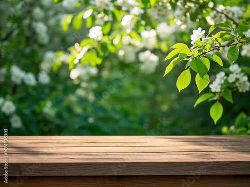 Empty wooden desk with free space and a springtime background of a home garden, perfect for catering service promotions, product display, or social media posts.

