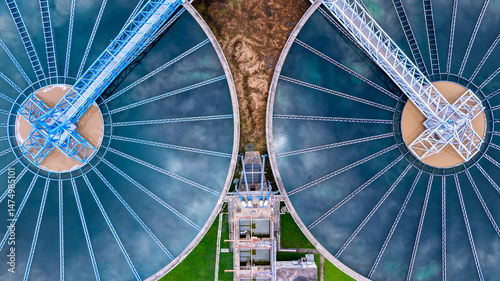 Tableau sur toile Aerial view circular clarifier tank at wastewater treatment plant, Industrial infrastructure, Environment technology sustainable water management system, Sedimentation tank circular clarifier
