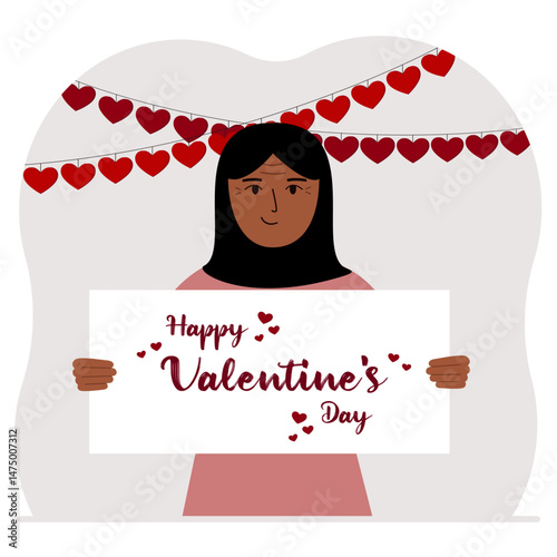 Happy woman holding a poster with text Happy Valentine's Day and red hearts. Love concept. Happy Valentine's Day wallpaper, poster, postcard or congratulation.