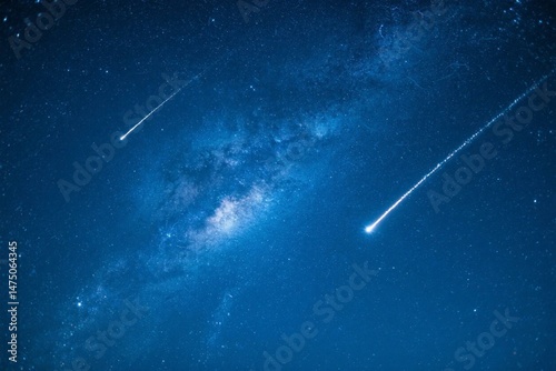 Stunning view of the milky way galaxy with bright meteor showers across the night sky.