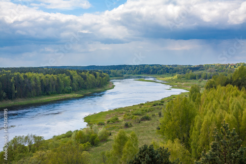 View of the Daugava river on sunny spring day from Vasargelišķi observation tower in Daugavas Loki nature park in Latgale, Latvia