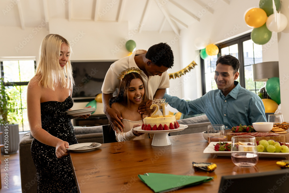 Obraz premium Friends gathering around birthday cake, celebrating and smiling at home party