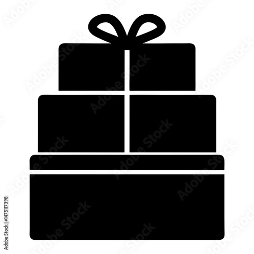 Three stacked gift boxes tied with a ribbon on top of all