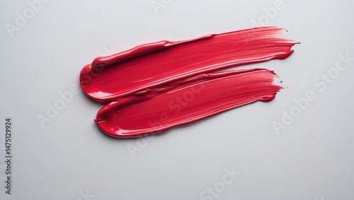 Lipstick brush stroke isolated on a neutral background