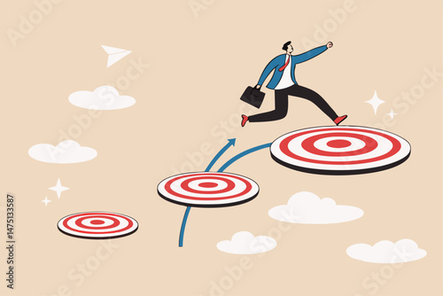 Aspiration and motivation to achieve bigger business target, advancement in career or business growth concept, smart businessman jumping on bigger and higher archery bull's eye target.