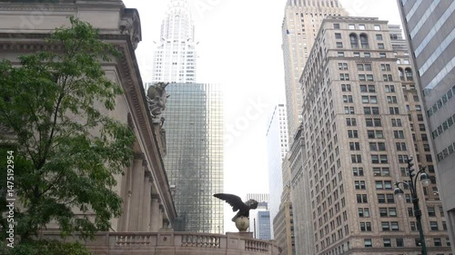 New York City Grand Central Terminal railway station building architecture, 42 street. Manhattan Midtown, Pershing Square, NYC, USA. Urban America. Cast iron eagle statue sculpture, United States.